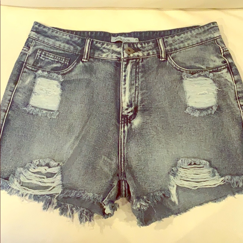 Distressed jean shorts.